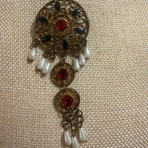 Elegant Gold and Red Dangle Brooch